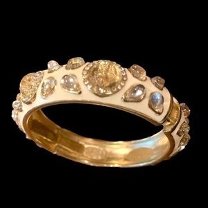 Gorgeous white enamel cuff bracelet with crystal embellishments.